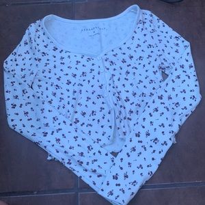A white long sleeve crop top button so u can unbutton from Aeropostale